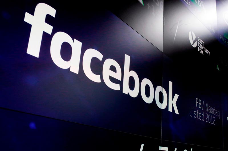 FILE: In this March 29, 2018, file photo, the logo for Facebook appears on screens at the Nasdaq MarketSite in New York's Times Square. Photo: AP/file