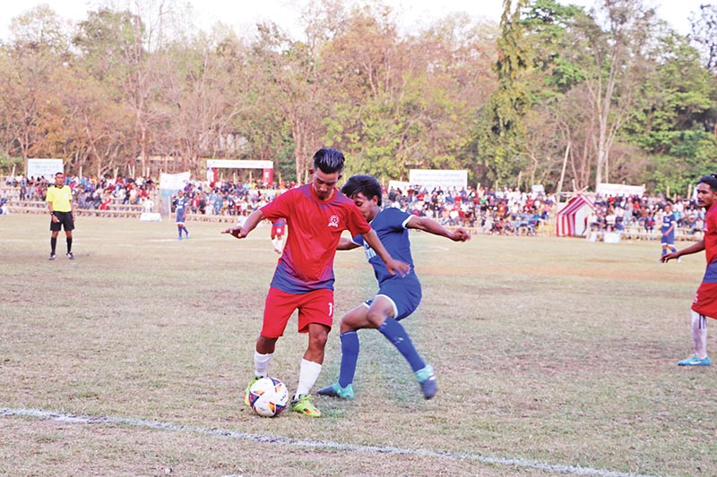 Players of Saraswoti Youth Club and Ruslan Three Star Club (right) vie for the ball during their quarter-final match of the second Bhugarbha Cement Martyrs Memorial Makawanpur Gold Cup in Hetauda on Tuesday. Photo: THT