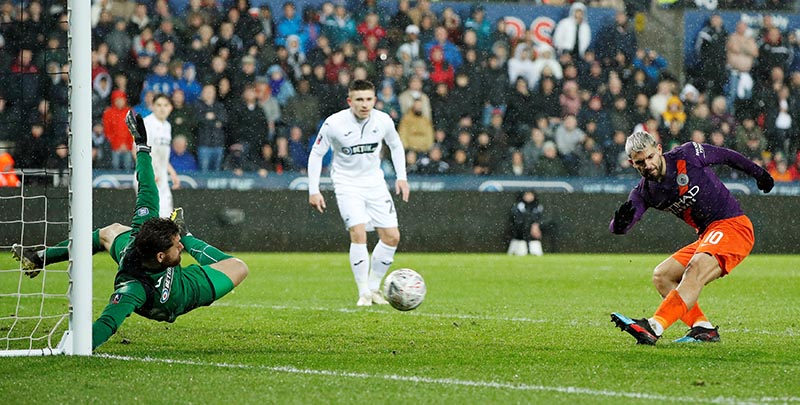 Manchester City's Sergio Aguero shoots at goal during the FA Cup Quarter Final match between Swansea City and Manchester City, at Liberty Stadium, in Swansea, Britain, at March 16, 2019. Photo: Action Images via Reuters