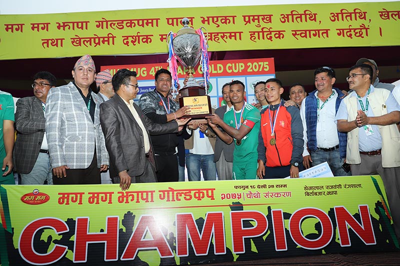 TAC skipper Bharat Khawas receiving the trophy after winning the Mugmug Jhapa Gold Cup in Birtamod on nMonday, March 11, 2019. Photo: THT