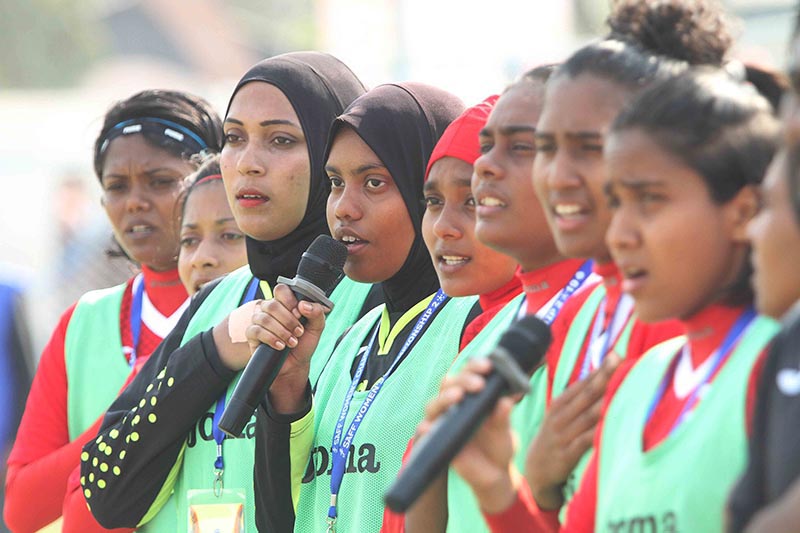Substitute players of Maldives sing their national anthem after organizer failed to play audio before match against India during the Womenu2019s SAFF Champioship at Shahid Rangasala in Biratnagar on Wednesday, March 13, 2019. Photo: Udipt Singh Chhetry/THT