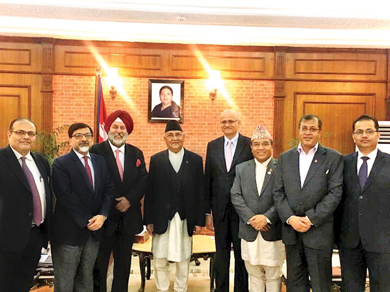 Prime Minister KP Sharma Oliu00a0 posing for a photo with Indian Foreign Secretary Vijay Keshav Gokhale (fourth from right), Indian Ambassador to Nepal Manjeev Singh Puri (third from left), Foreign Secretary Shankar Das Bairagi (third from right),u00a0 and other Nepali and Indian officials, at Baluwatar, Kathmandu, on Thursday.