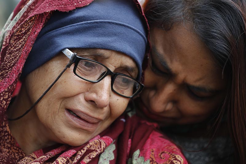 A woman who lost her husband during Friday's mass shootings cries outside an information center for families, on Saturday, March 16, 2019, in Christchurch, New Zealand. Photo: AP