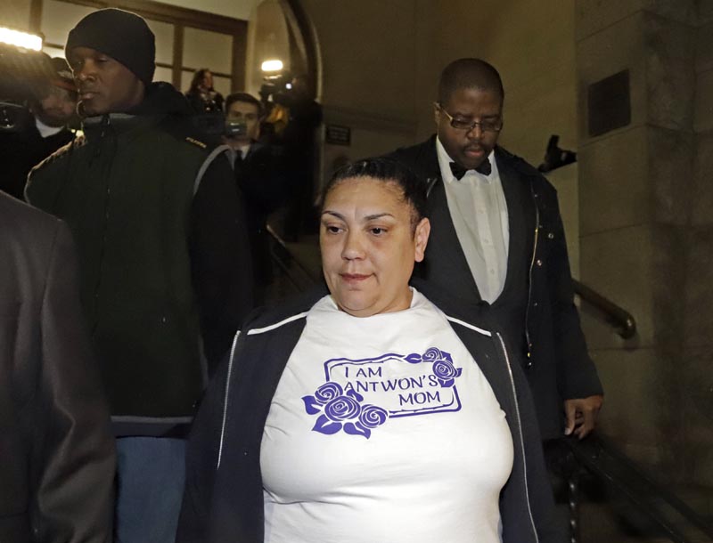 Michelle Kenney, centre, the mother of Antwon Rose II, leaves the Allegheny County Courthouse with supporters after hearing the verdict of not guilty on all charges for Michael Rosfeld, a former police officer in East Pittsburgh, United States, on Friday, March 22, 2019. Photo: AP
