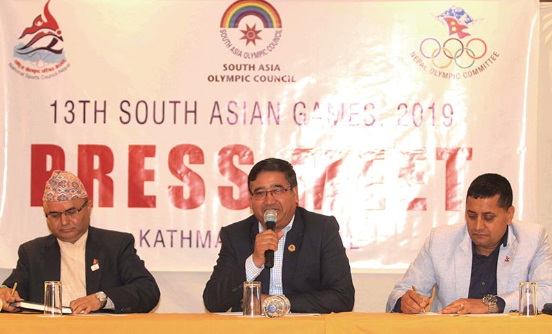 Jeevan Ram Shrestha (center) President of Nepal Olympic Committee reacts with media during press meet of the 13th South Asian Games in Kathmandu on Tuesday. Photo: THT