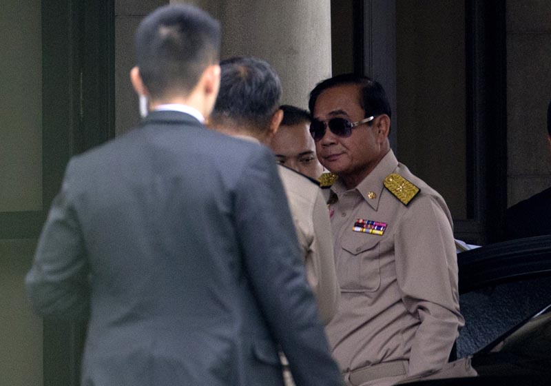 Thai Prime Minister Prayuth Chan-ocha, right, arrives at Government house in Bangkok, Thailand, Monday, March 25, 2019.Photo: AP