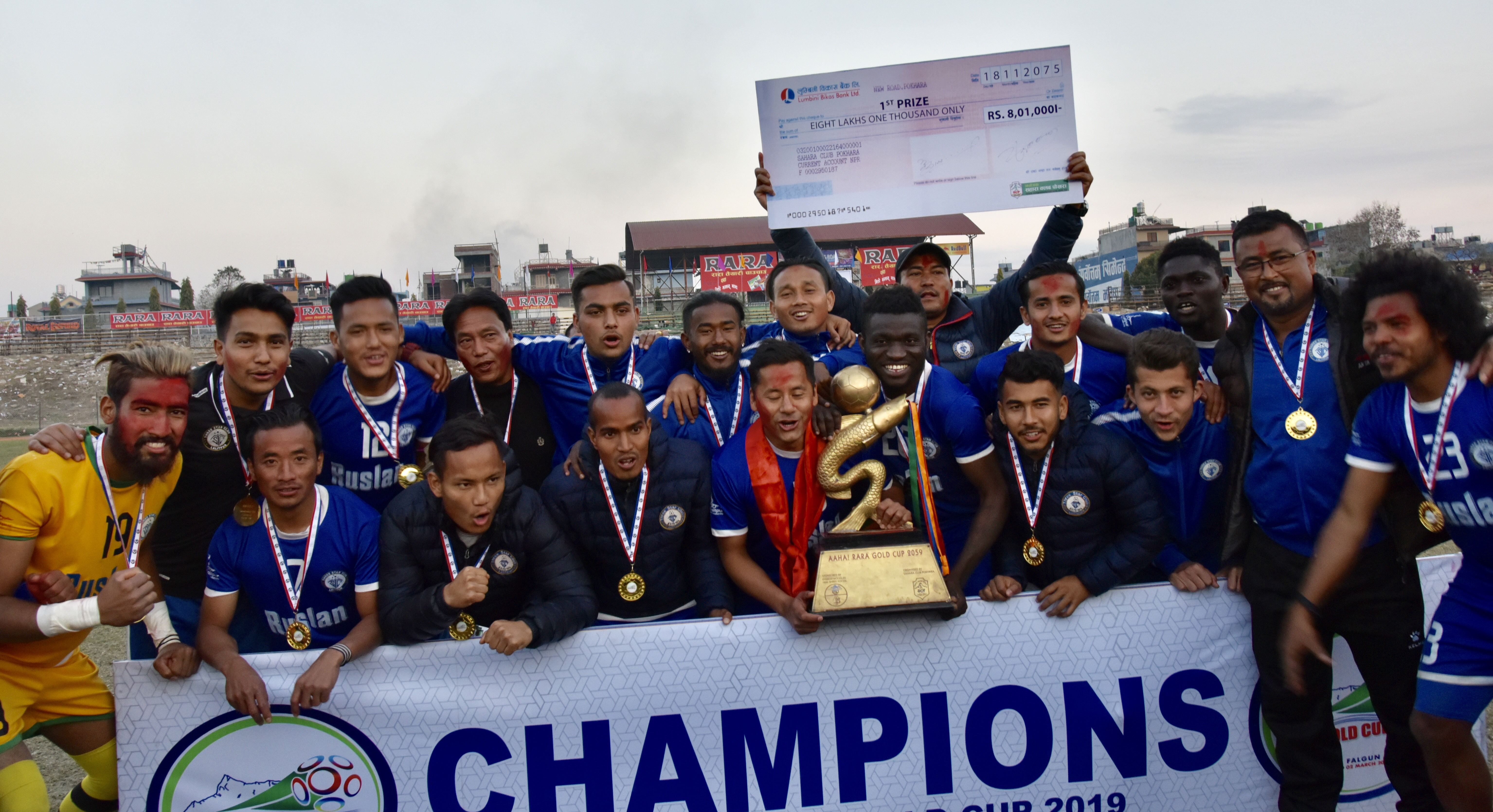 Players and officials of Ruslan Three Star Club celebrate after winning the 17th Aaha Rara Gold Cup in Pokhara on Saturday. Photo: THT