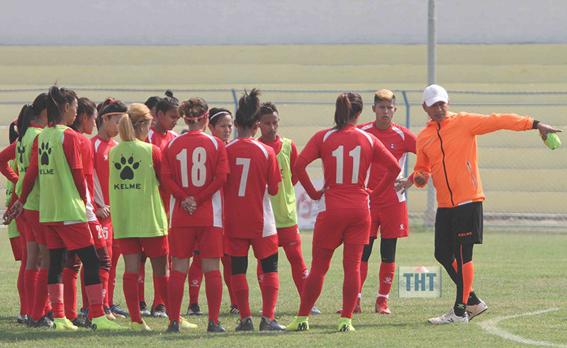 Hari Khadka (right) head coach of womenu2019s national team gives instructions to players during training session at Shahid Rangasala in Biratnagar on Friday, March 15, 2019. Photo: Udipt Singh Chhetry/THT