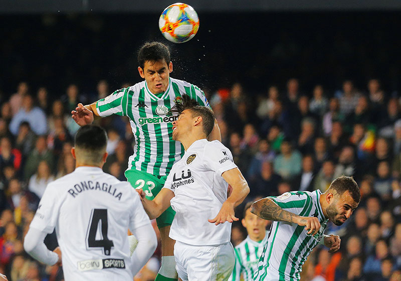 Valencia's Gabriel Paulista in action with Real Betis' Aissa Mandi during the Copa Del Rey Semi Final Second Leg during Valencia and Real Betis, at Mestalla, in Valencia, Spain, on February 28, 2019. Photo: Reuters