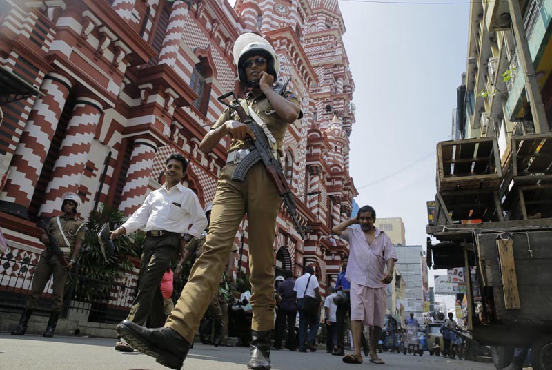 A Sri Lankan police officer patrols out side a mosque in Colombo, Sri Lanka, Wednesday, April 24, 2019. Photo: AP