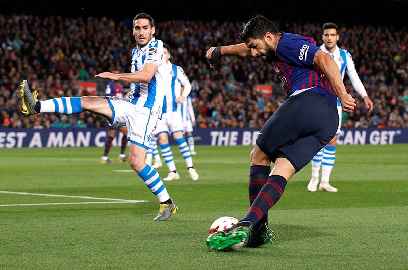 Barcelona's Luis Suarez shoots at goal during the La Liga match between FC Barcelona and Real Sociedad, at Camp Nou, in Barcelona, Spain, on April 20, 2019. Photo: Reuters
