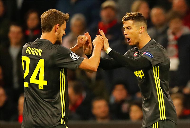 Juventus' Cristiano Ronaldo celebrates scoring their first goal with Daniele Rugani during the Champions League Quarter Final First Leg match between Ajax Amsterdam and Juventus, at Johan Cruijff Arena, in Amsterdam, Netherlands, on April 10, 2019. Photo: Reuters