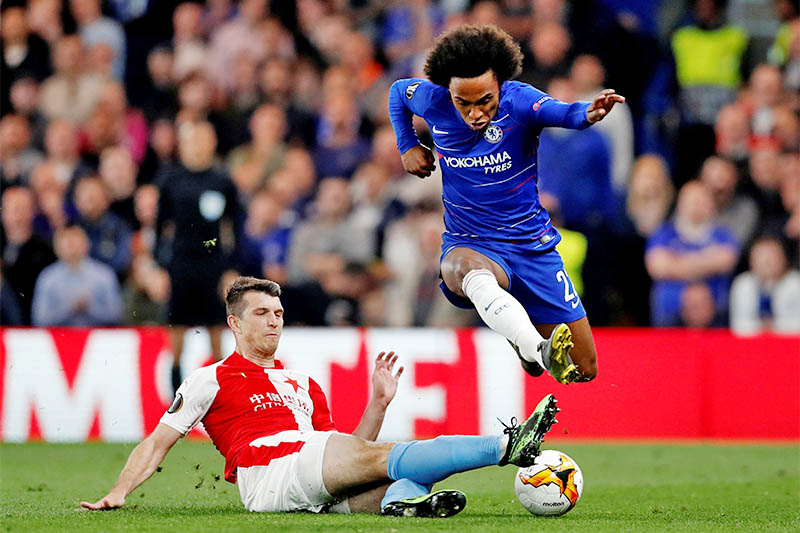 Chelsea's Willian in action with Slavia Prague's Ondrej Kudela. Photo: Reuters