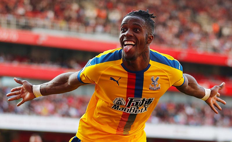 Crystal Palace's Wilfried Zaha celebrates scoring their second goal during the Premier League match between Arsenal and Crystal Palace, at Emirates Stadium, in London, Britain, on April 21, 2019. Photo: Reuters