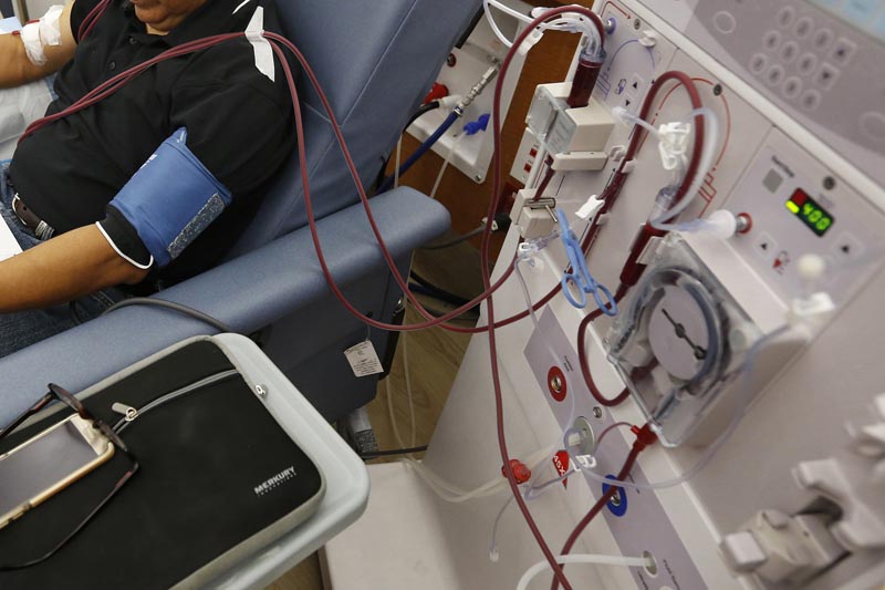 FILE: In this Monday, September 24, 2018 file photo, a patient undergoes dialysis at a clinic in Sacramento, California Results of a study released on Sunday, April 14, 2019 show that the diabetes drug Invokana has been shown to help prevent or delay worsening of kidney disease, which causes millions of deaths each year and requires hundreds of thousands of people to use dialysis to stay alive. Photo: AP