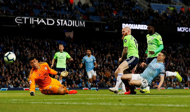 Manchester City's Phil Foden shoots at goal during the Premier League match between Manchester City and Cardiff City, at Etihad Stadium, in Manchester, Britain, on April 3, 2019. Photo: Action Images via Reuters