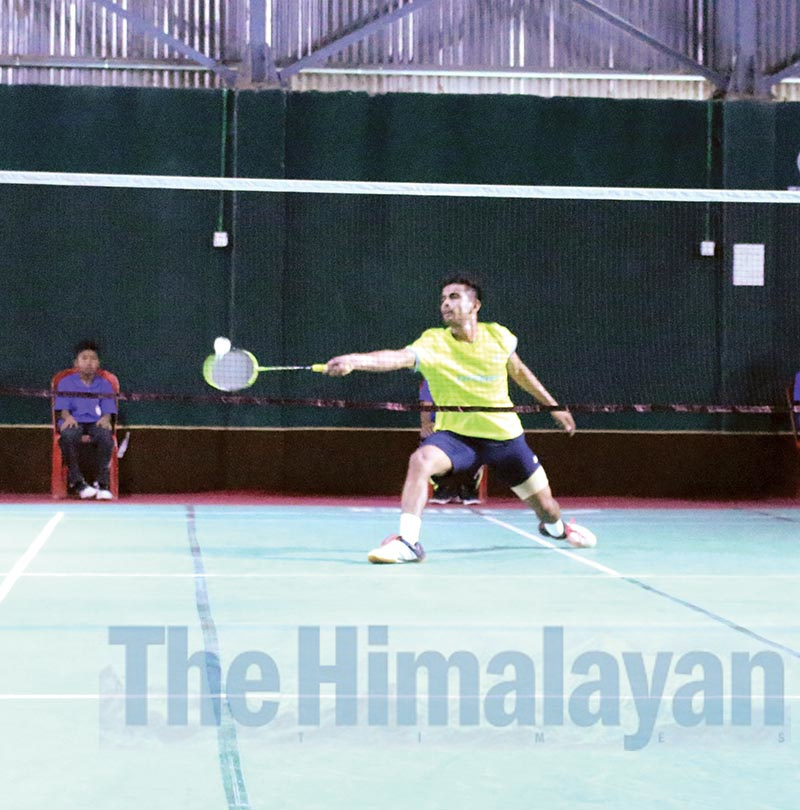 Dipesh Dhami of Nepal Police Club in action druing the 40th National Badminton Championship, under the eighth National Games on Saturday.