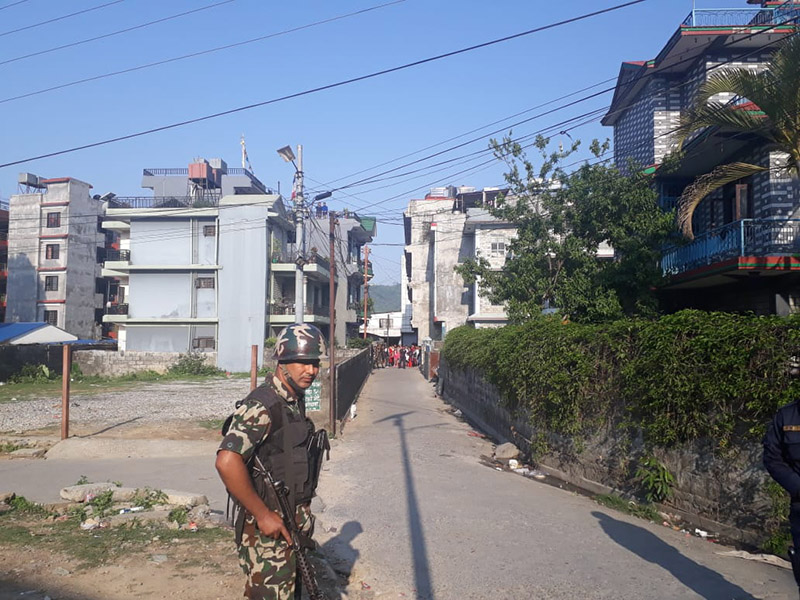 A Nepal Army personnel is seen securing the area where an explosive device was found, near Manav Adhikar Chok, in Pokhara Metropolitan City, on Saturday, April 20, 2019. Photo: Rishi Ram Baral/THT