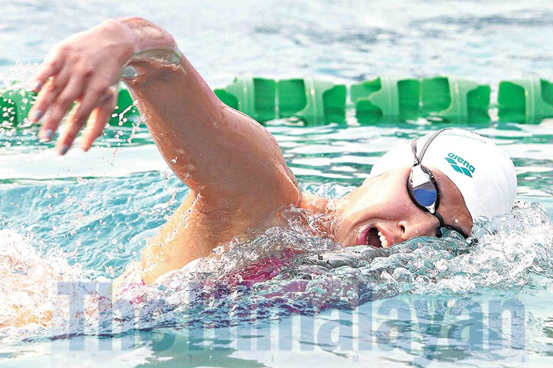 Gaurika Singh of Tribhuvan Army Club swims in women's 400 meters freestyle finals during the 8th National Games at Cygnett Hotel swimming pool in Nepalgunj on Monday. Photo: Udipt Singh Chhetry