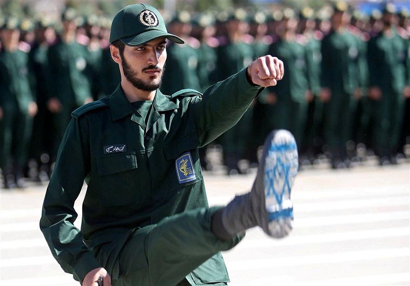 FILE: An Iranian Officer of Revolutionary Guards, with Israel flag drawn on his boots, is seen during graduation ceremony, held for the military cadets in a military academy, in Tehran, Iran June 30, 2018. Photo: Tasnim News Agency/via Reuters/file