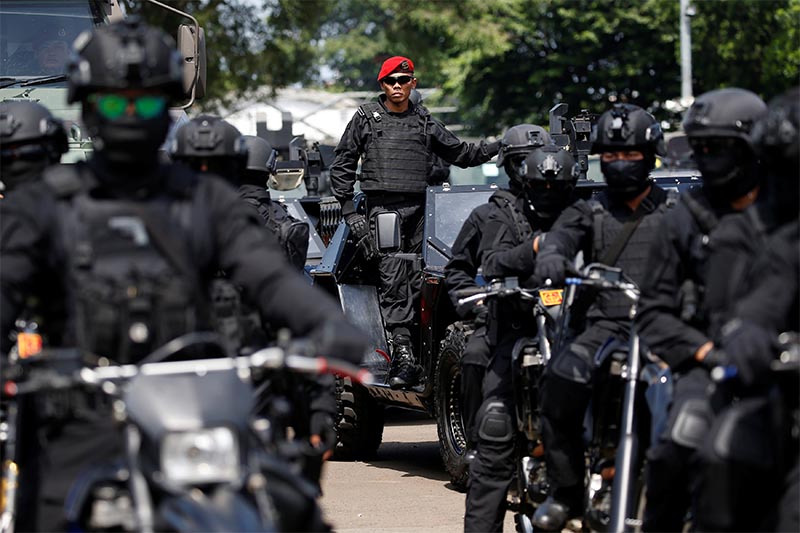 An Indonesian Army special forces soldier stands on P6 ATAV light attack vehicle before deployment ahead of the upcoming Indonesia's general election in Jakarta, Indonesia, on April 14, 2019. Photo: Reuters