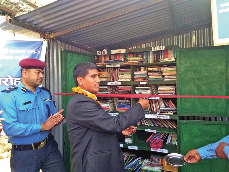 Chief District Officer Lalit Kumar Basnet inaugurating a newly-established library at Jajarkot District Prison for inmates, on Saturday. Photo: RSS