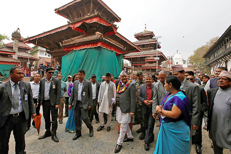 Prime Minister KP Oli, visits the rebuilding site at Hanumandhoka Durbar Square, a UNESCO world heritage site affected during the April 2015 earthquake, in Kathmandu, on Thursday, April 25, 2019. Photo: Reuters