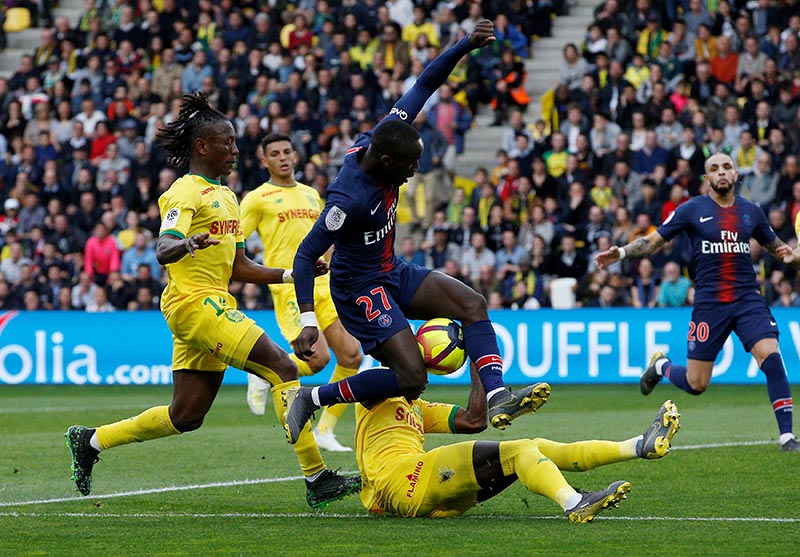 Paris St Germain's Moussa Diaby in action with Nantes' Charles Traore during the  Ligue 1, at Nantes and Paris St Germain, at The Stade de la Beaujoire, Louis Fonteneau, in Nantes, France, on April 17, 2019. Photo: Reuters