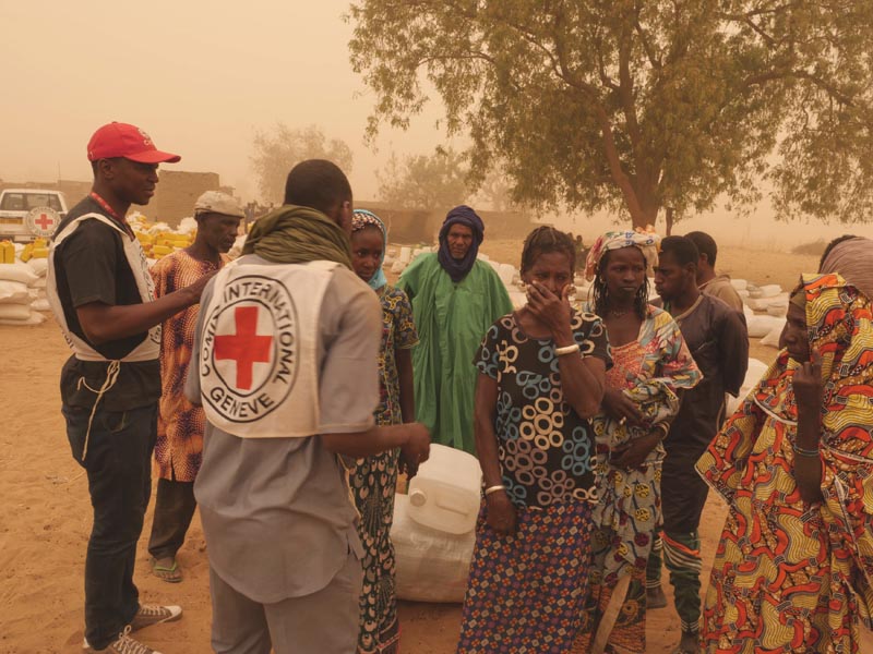Villagers are seen following the March 23 attack by militiamen that killed about 160 Fulani people, in Ogossagou Village, Mali, March 31, 2019 in this handout picture obtained April 18, 2019. Photo:ICRC via Reuters