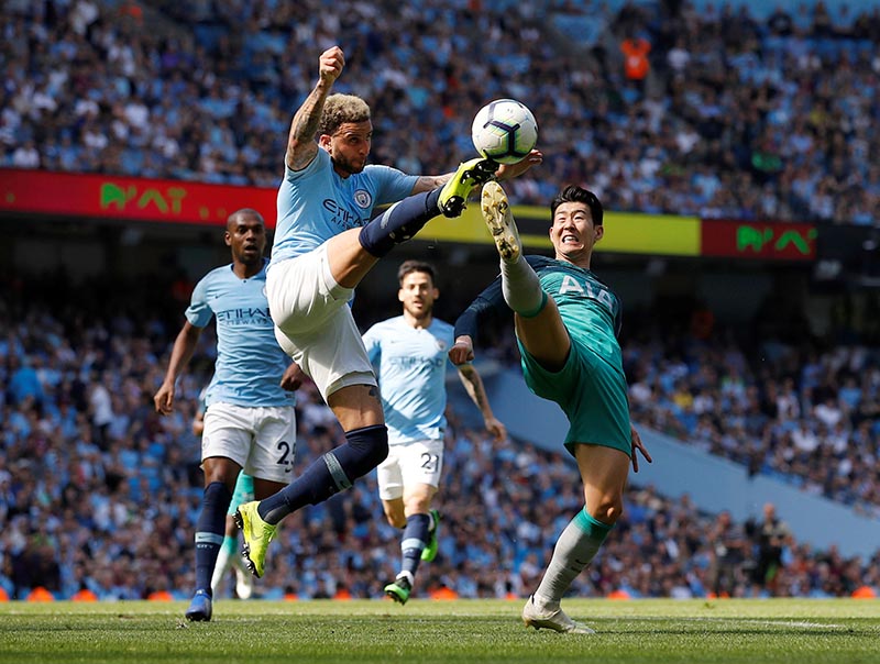 Manchester City's Kyle Walker in action with Tottenham's Son Heung-min during the Premier League match between Manchester City and Tottenham Hotspur, at Etihad Stadium, in Manchester, Britain, on April 20, 2019. Photo: Reuters