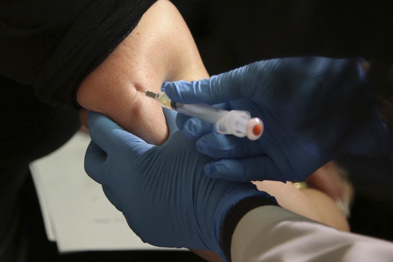 FILE: In this March 27, 2019, file photo, a woman receives a measles, mumps and rubella vaccine at the Rockland County Health Department in Pomona, NY. Photo: AP/file