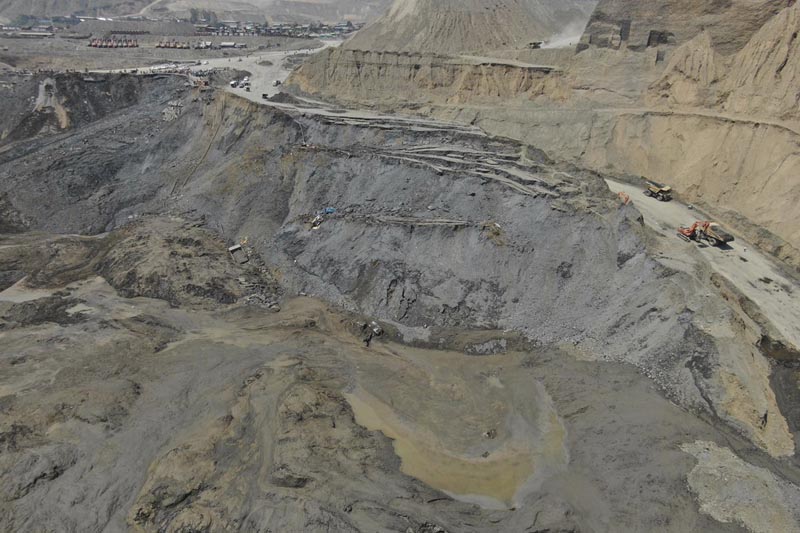 A view overlooking the scene of a mudslide at a jade gemstone mining site looking down where the mudslide swept away workers and covered mining equipment, including bulldozers and backhoes, Tuesday, April 23, 2019, in Hpakant area of Kachin state, northern Myanmar. Photo: Zaw Moe Htet via AP