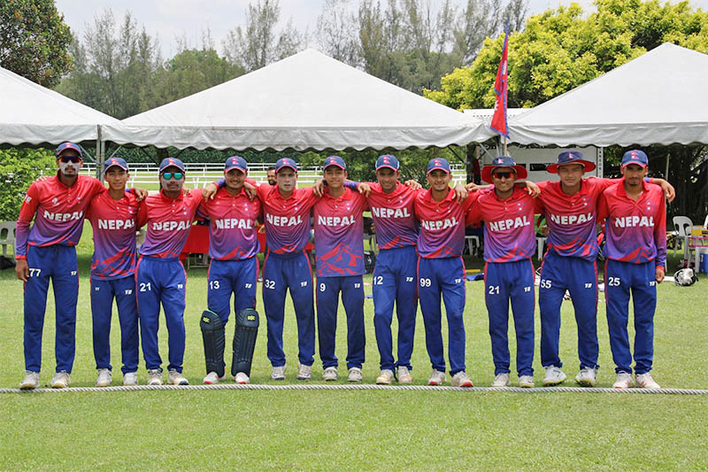 Nepal's U-19 cricket team pose for a portrait prior to their game against Kuwait, in Kinrara Academy Oval, Kuala Lumpur, on Thursday, April 18, 2019. Photo: Raman Shiwakoti