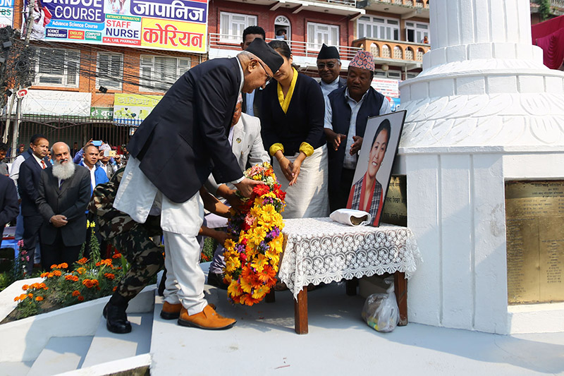 Prime Minister KP Sharma Oli offering a flower wreath in honour of late Pasang Lhamu Sherpa, on the occasion of the 26th anniversary of Sherpa's successful ascent of Sagarmatha or Mount Everest, in Kathmandu, on Tuesday, April 23, 2019. Photo: RSS