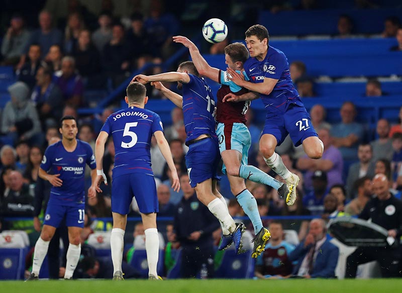 Burnley's Ashley Barnes in action with Chelsea's Andreas Christensen during the Premier League match between Chelsea and Burnley, at Stamford Bridge, in London, Britain, on April 22, 2019. Photo: Reuters