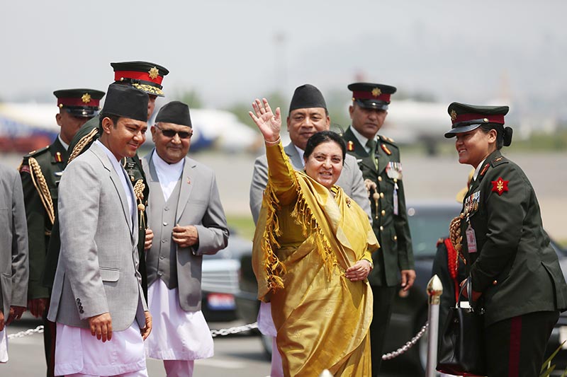 President Bidya Devi Bhandari waving to mediapersons before leaving for state visit to China, at Tribhuvan International Airport, Kathmandu, on Wednesday, April 24, 2019. Photo: THT