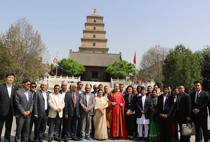 President Bidya Devi Bhandari, Foreign Minister Pradeep Kumar Gyawali among other members of Nepali delegation, and Chinese officials pose for a group photo on the premises of Daci'en Temple, in Xi'an, Shaanxi Province, on Thursday, April 25, 2019. The president is on nine-day state visit to China at the invitation of Chinese President Xi Jinping. Photo: RSS