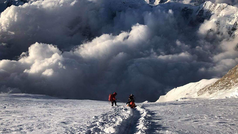 Rescuers bringing down Wui Kin Chin from 7,500 m on Mt Annapurna. Photo courtesy: Mingma David Sherpa