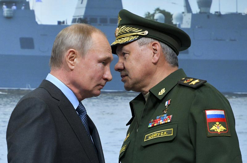 Russian President Vladimir Putin, left, and Russian Defense Minister Sergei Shoigu during a visit a shipyard in St Petersburg, Russia, Tuesday, April 23, 2019. Photo: Alexei Druzhinin, Sputnik, Kremlin Pool Photo via AP