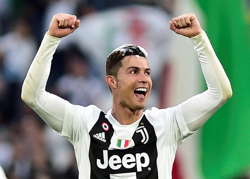 Juventus' Cristiano Ronaldo celebrates winning the league after the Serie A match between Juventus and Fiorentina, at Allianz Stadium, in Turin, Italy, on April 20, 2019. Photo: Reuters