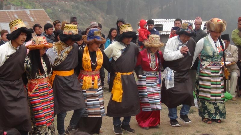 Men and women from the Sherpa community performing cultural dance at Ranke Bazaar, in Panchthar district, on Wednesday, April 24, 2019. Photo: Laxmi Gautam/THT