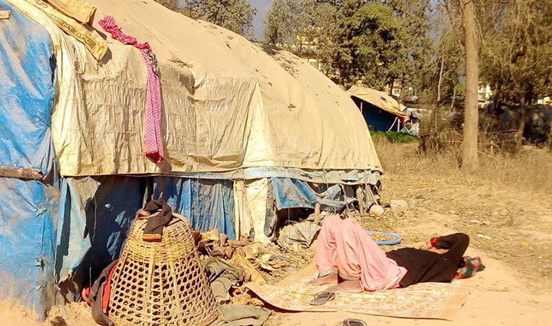 A flood victim sleeping outside  a make-shift tent, in Birendranagar, Surkhet, on Wednesday, April 11, 2019. Photo: THT