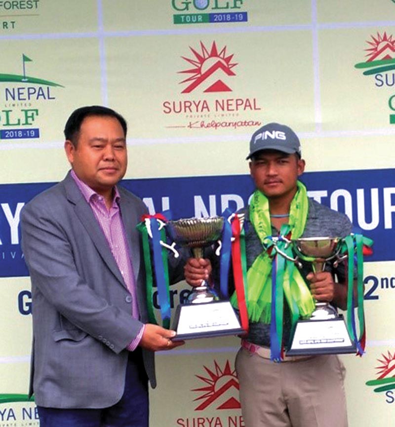Tanka Bahadur Karki receives the trophy from Marketing Manager of Surya Nepal Pvt Ltd Bal Kishan Gurung after the Surya Nepal NPGA Tour Championship in Kathmandu on Thursday.
