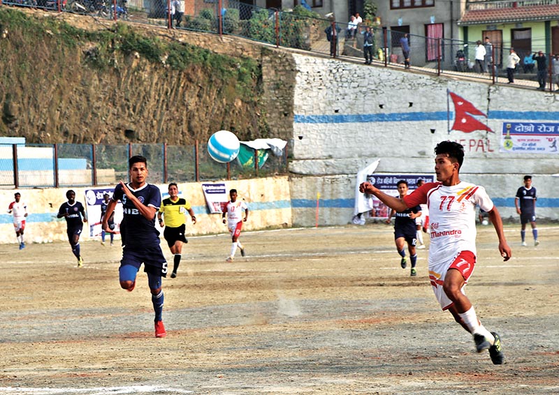 Players of Nepal APF Club and NIBL Friends Club (left) in action during their second Roj Bahini Chandragiri Gold Cup match in Kathmandu on Monday. Photo: THT