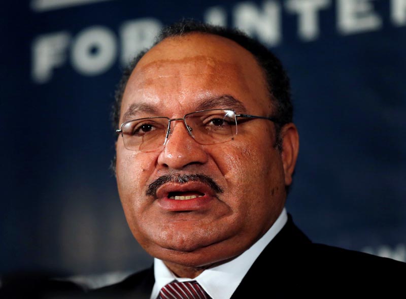 FILE: Papua New Guinea's then Prime Minister Peter O'Neill makes an address to the Lowy Institute in Sydney, Australia November 29, 2012. Photo: Reuters/file