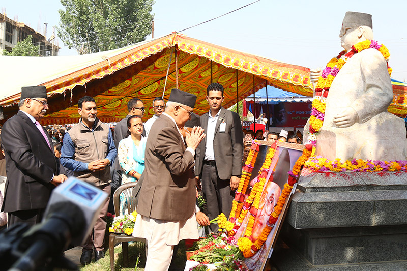 Prime Minister and NCP (NCP) Co-Chair KP Sharma Oli paying tribute to late Madan Bhandari and Jibaraj Ashrit, on the occasion of 26th Madan-Ashrit Memorial Day, at Madan Nagar, Balkhu, in Kathmandu, on Friday, May 17, 2019. Photo: RSS.