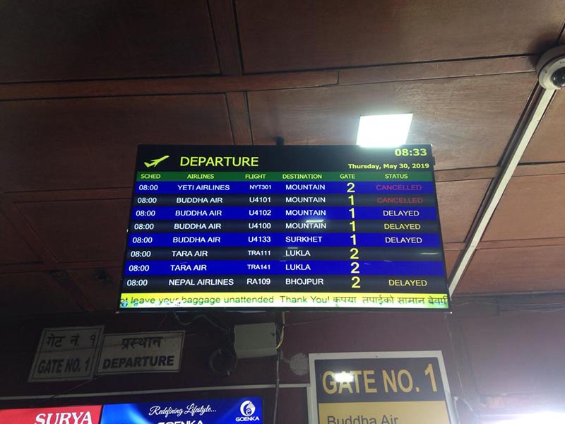 A flight information display at the domestic terminal of Tribhuvan International Airport showing flights delayed or cancelled, on Thursday, May 30, 2019. Photo: THT Online