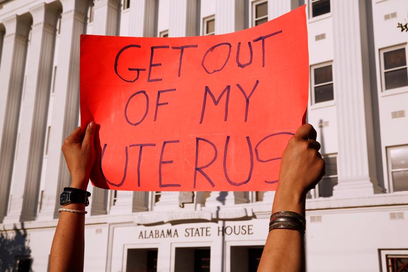 FILE: Pro-choice supporters protest in front of the Alabama State House as Alabama state Senate votes on the strictest anti-abortion bill in the United States at the Alabama Legislature in Montgomery, Alabama, US May 14, 2019.  Photo: Reuters