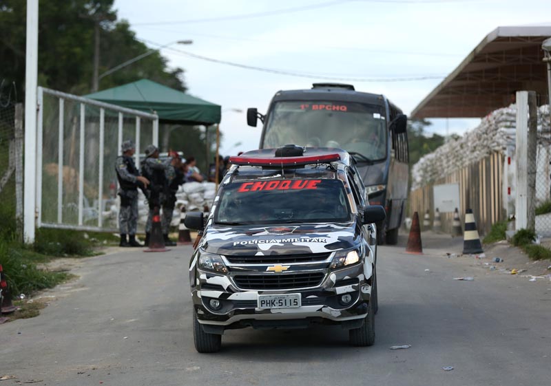 Riot polive leave a prison complex in the Brazilian state of Amazonas after prisoners were found strangled to death in four separate jails, according to the penitentiary department in Manaus, Brazil May 27, 2019. Photo: Reuters