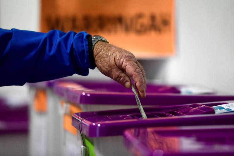 A voter participates in early voting at a pre-polling booth at Central Station, Sydney, Australia, April 29, 2019. Photo: AP